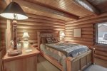 Bear Butte Gulch Lodge  with queen bed.